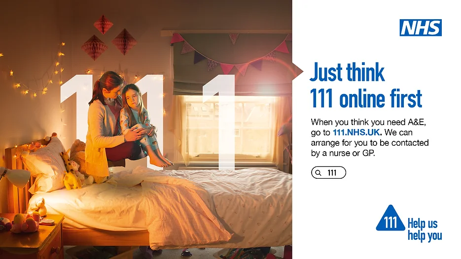 Young girl sat with parent in bedroom appearing to be unwell.  111 help us help you logo on bottom right corner.